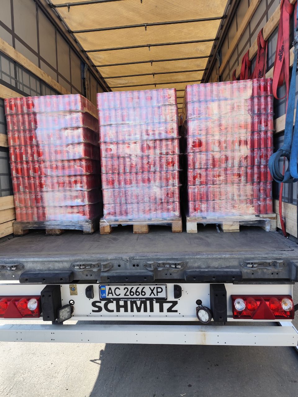 Three Coca-Cola pallets Schmitz semi-trailer Eastern Europe